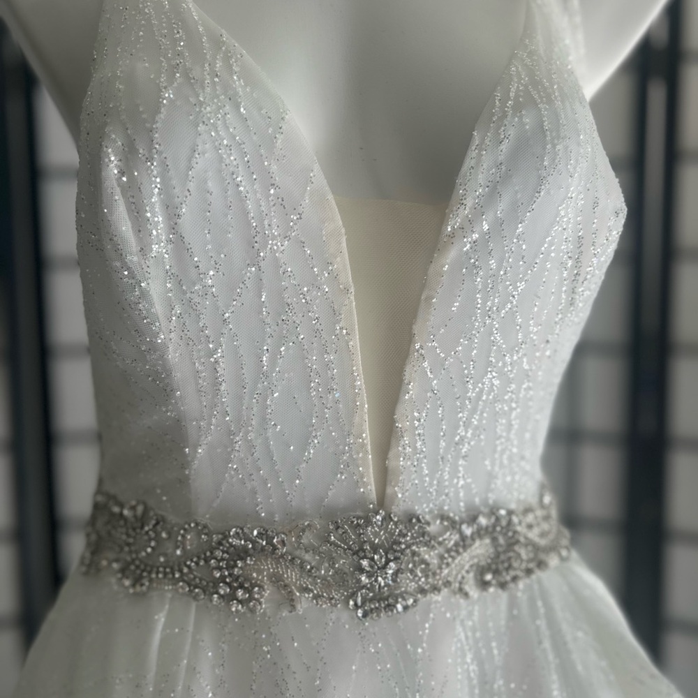 Elegant Glittery White Gown with Silver Accents - Picture 4 of 7